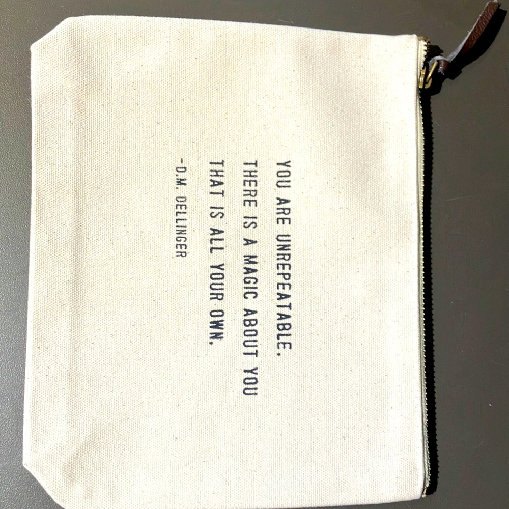 NWOT Canvas zip pouch.
